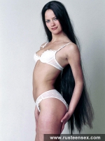 Cute teen brunette licks her dildo
