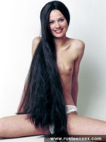 Cute teen brunette licks her dildo