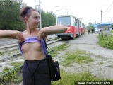 Russian teen brunette undresses outdoor