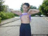 Russian teen brunette undresses outdoor