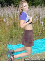Pantyhose teen blonde plays with pantyhose outdoot