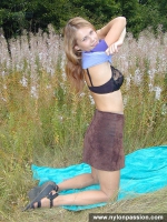 Pantyhose teen blonde plays with pantyhose outdoot