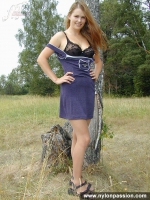 Pantyhosed teen girl undressing in the forest