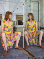 Redhead mature naked posing