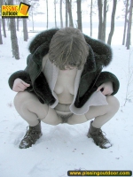 Winter outdoor pissing of blonde babe