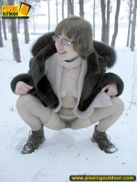 Winter outdoor pissing of blonde babe