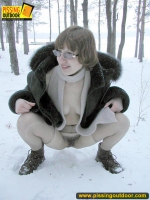 Winter outdoor pissing of blonde babe