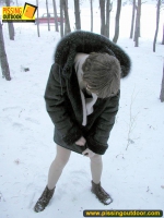 Winter outdoor pissing of blonde babe