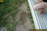 Teen pisses on a park bench