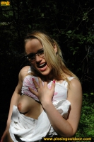 Outdoor pissing in shady park