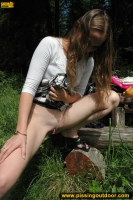 Pissing outdoor on huge plantain leaves