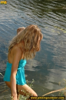 Pissing in the lake in a summer day