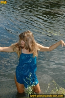 Pissing in the lake in a summer day
