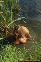 Pissing in the lake in a summer day