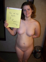 American couple posing to ranch