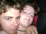 American couple posing to ranch