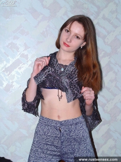 Young longhaired brunette stripping - N