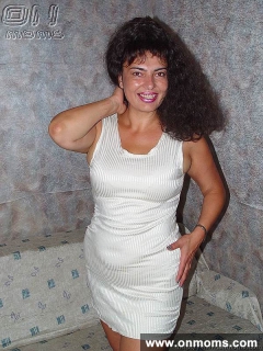 Mature brunette with big tits - N