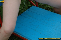 Pissing on a outdoor teeterboard - N