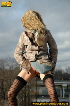 Teen blonde pissing outdoor near the highway - N
