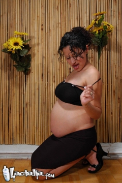 Busty pregnant slut Talia licking her tits and rubbing her - N