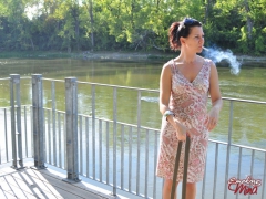 Amateur brunette babe Mina outdoor sexy smoke session - N