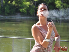 Amateur brunette babe Mina outdoor sexy smoke session - N