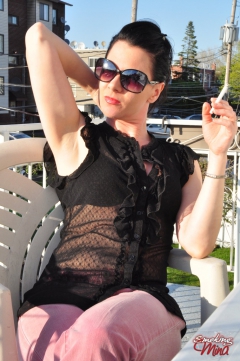 Brunette babe smoking at the terrace - N