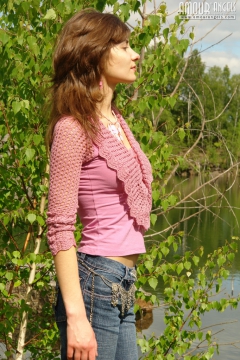 Girl pulling off her jeans - N
