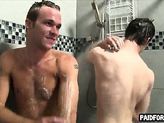 Two straight amateur hunks taking a shower together