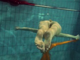 Yellow and Red clothed teen underwater