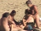 Outdoor group sex on the beach