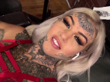 Amber Luke masturbates while getting tattooed