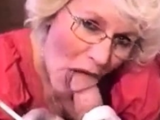 Very hot granny with glasses smoking while sucking dick