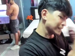 Two randy gay fellas giving blowjobs in group sex action