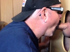 Mature DILF deepthroats gloryhole cock