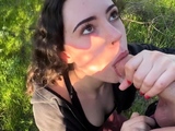 Amazing busty brunette slut doing blowjob outdoor