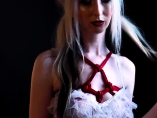 Stripping with ropes under dress