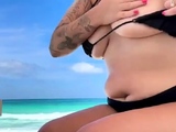 Busty curly brunette with big boobs fucks on couch