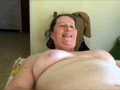 chubby-granny-annie-on-table-phone-as-sextoy-close-up