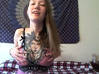 Busty curly brunette with big boobs fucks on couch