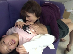Busty Asian lesbians licking and fingering one another