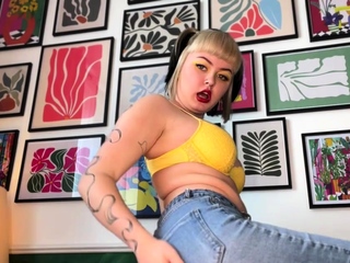 Blonde teen in solo action with her pussy